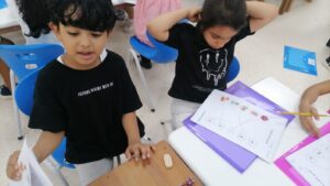 My young students actively perform their activities.  طلابي الصغار يؤدون أنشطتهم بكل نشاط